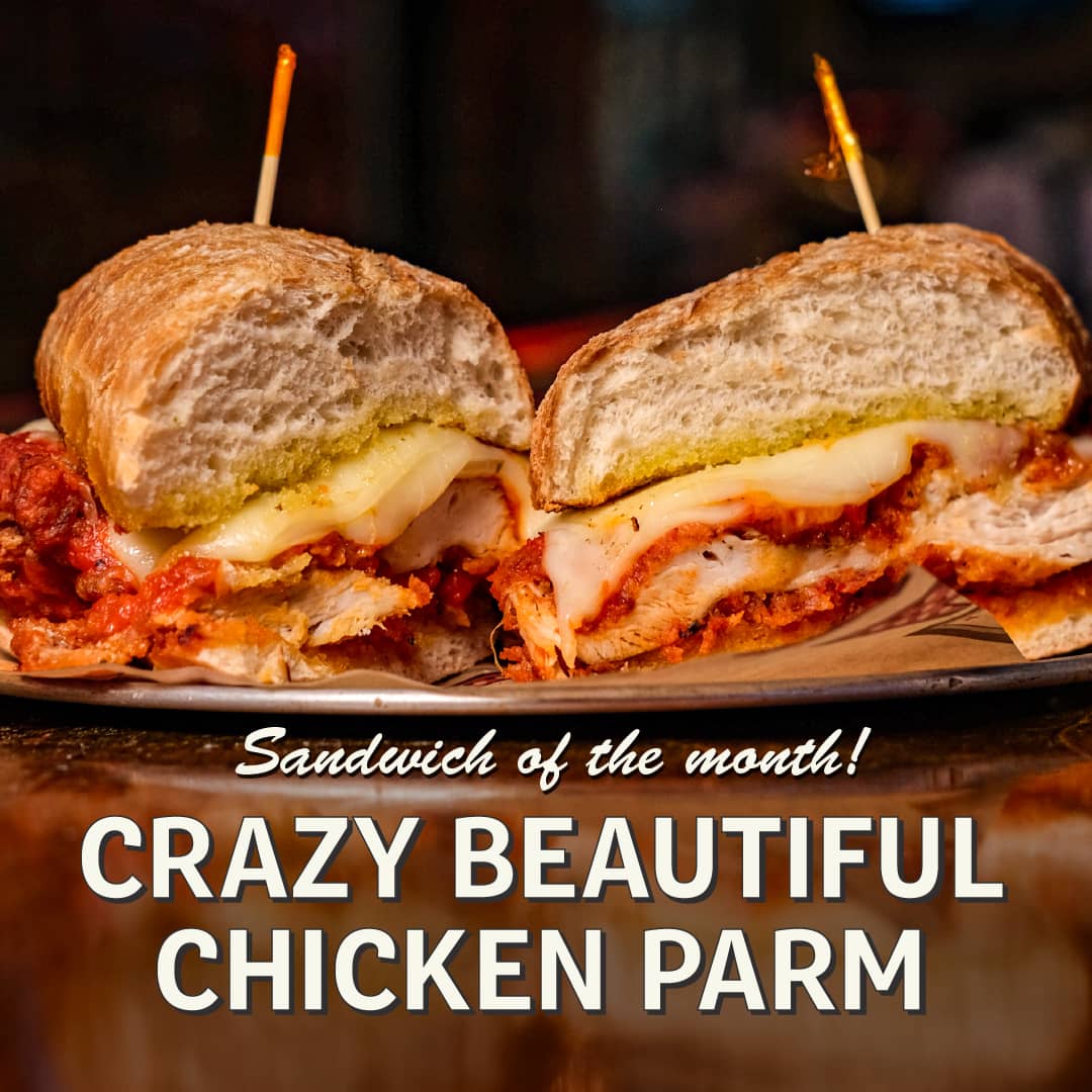 Promotional image for December's Burger of the Month at Carol's Pub: The Beautiful Crazy Chicken Parmesan Sandwich