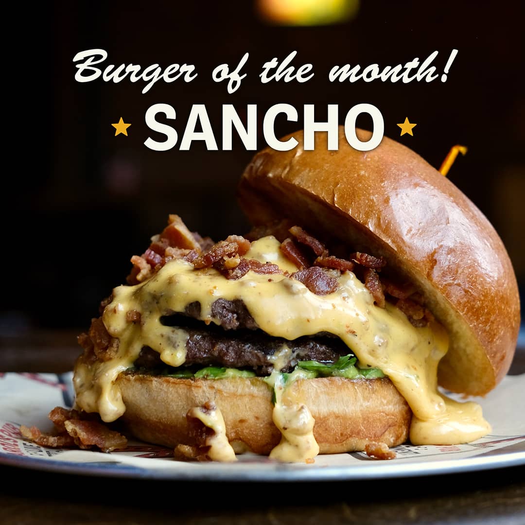 Promotional image for July's Sandwich of the Month at Carol's Pub: Sancho Burger