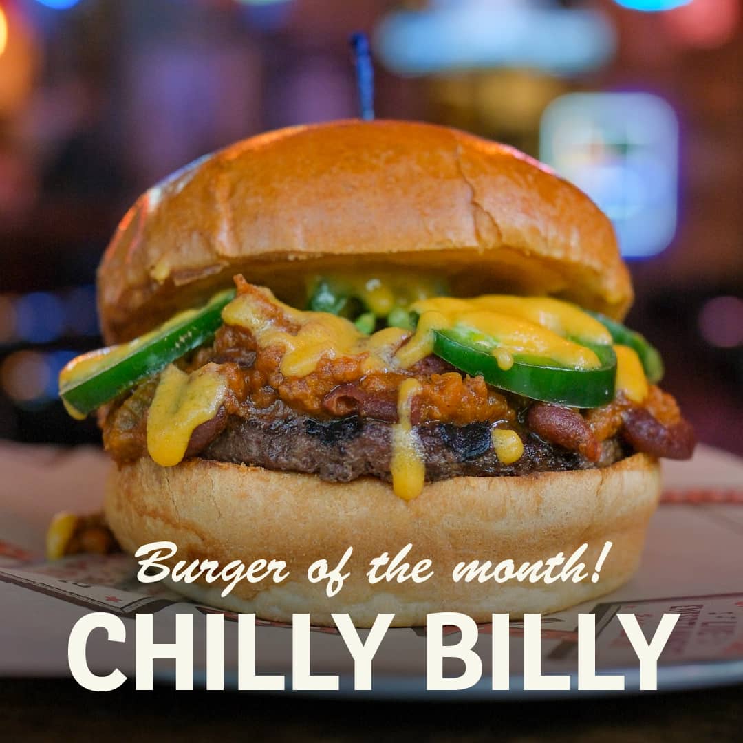 Promotional image for December's Burger of the Month at Carol's Pub: Chili Billy Burger